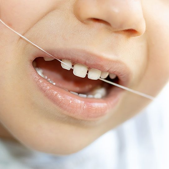 Jumpstart Your Child's Lifetime Flossing Habit - Beyond Dentistry in Chula Vista CA - Beyond Dentistry in Chula Vista CA -